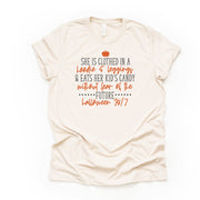 Clothed in Hoodie & Leggings, Eats Her Kids Candy, Halloween 24/7 Design on premium Bella + Canvas unisex shirt, 3 color choices, plus size