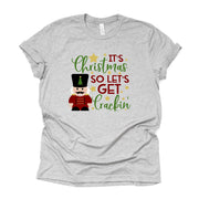 Christmas Tee, It's Christmas So Let's Get Crackin' Christmas Nutcracker Design on premium unisex tee, 2 color choices, plus sizes available