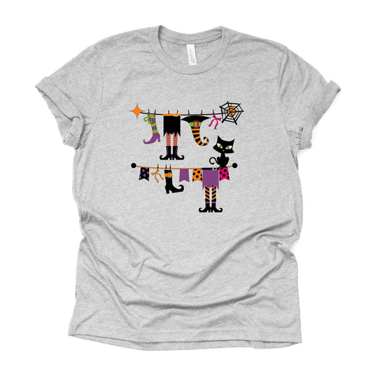 Halloween Tee, Unique Halloween Witch's Clothes & Boots Hanging on the Line Design, premium unisex shirt, 4 color choices, 3x fall, 4x fall